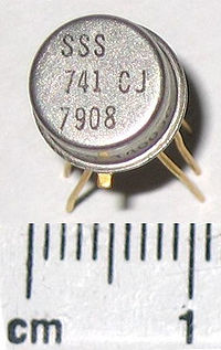 741 op-amp in TO-5 metal can package close-up.jpg