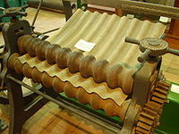 220px-Corrugated iron manual roller.JPG